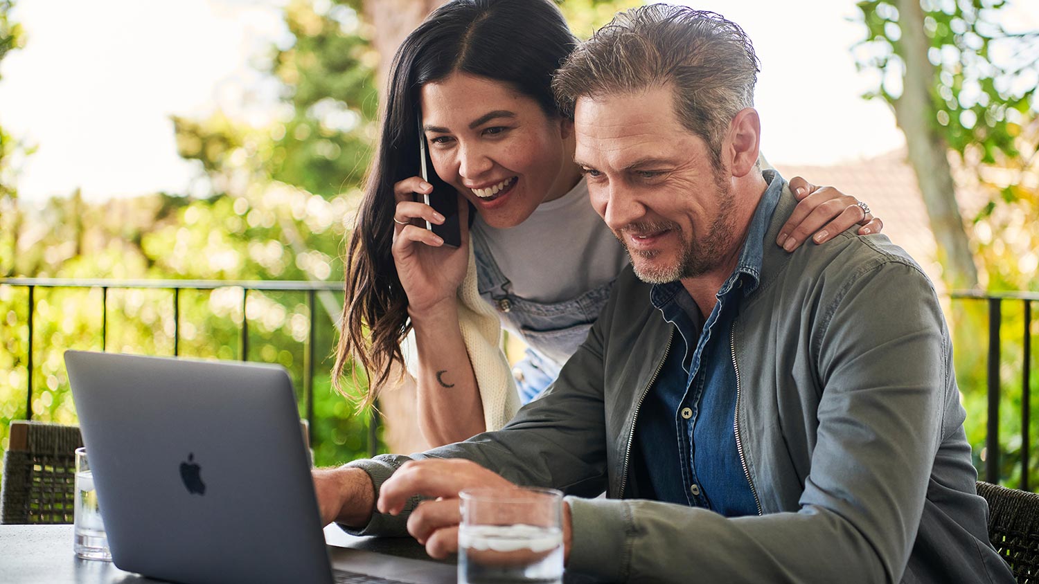Couple watching a laptop